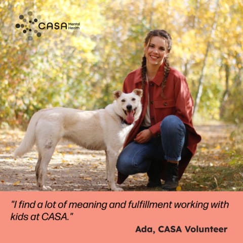 CASA volunteer Ada and her dog Eddy pose for a photo in a forest. The CASA logo appears in the top left corner. A pink banner across the bottom has a quote from Ada: "I find a lot of meaning and fulfillment working with kids at CASA."