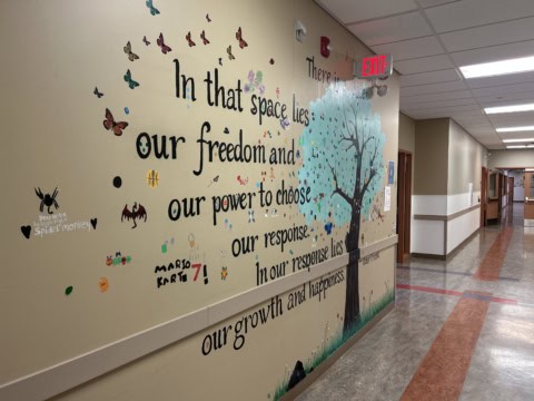 A hallway mural at CASA House Edmonton.